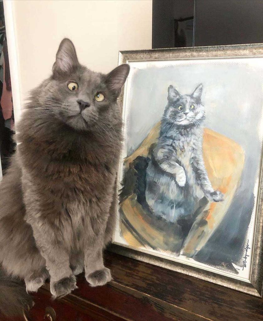 Cat and his portrait