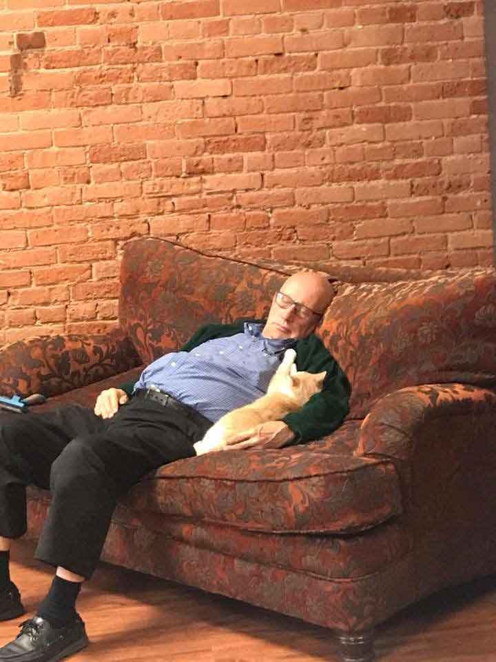 Terry Lauerman volunteer 75 years cat shelter nap