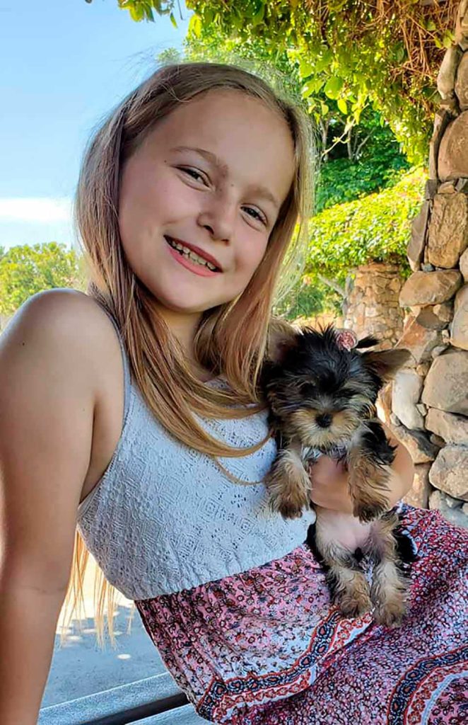 Cute puppy and girl