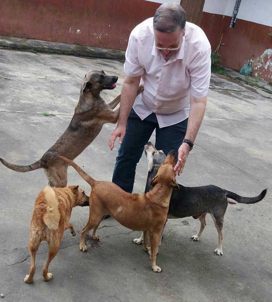 Father Joao and his rescued dogs
