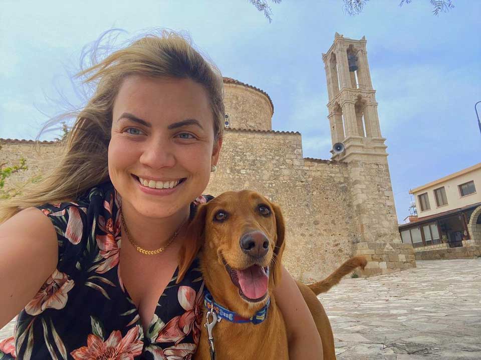 Woman travels the world taking care of pets